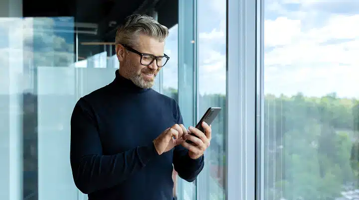 man checking his mobile